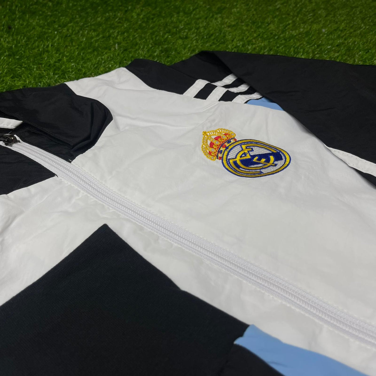 Real Madrid 2025 Windbreaker Jacket Black/White/Blue